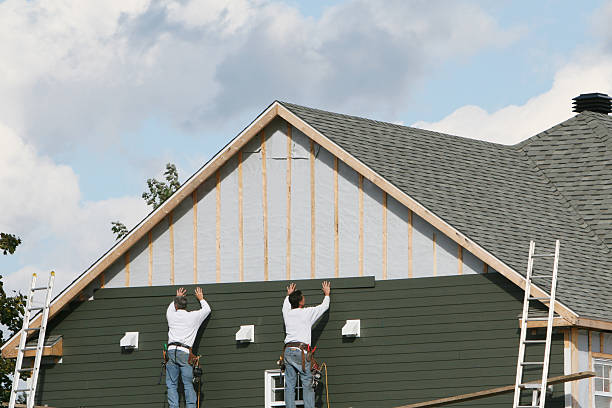 Professional Siding Contractor technician working in New Springfield, OH
